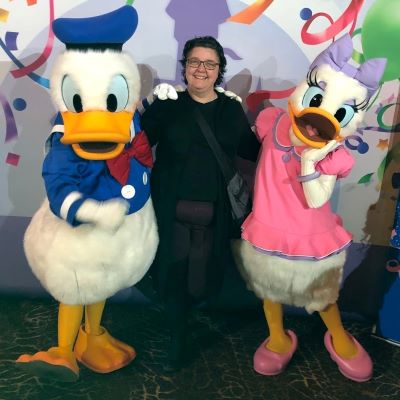 Palling around with Donald and Daisy.